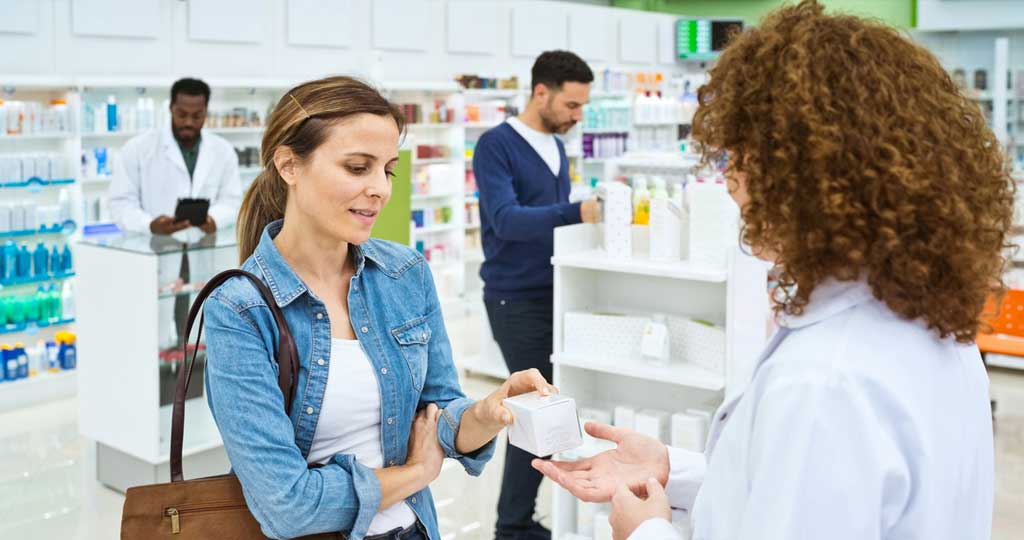 A lady purchasing precription drugs