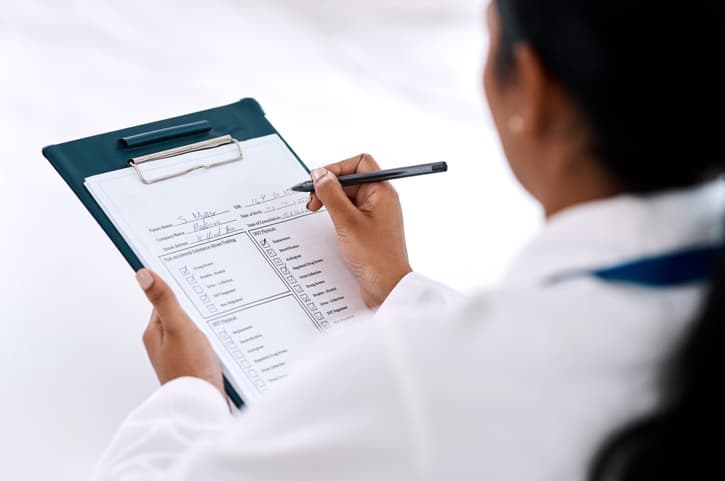 Person holding clipboard