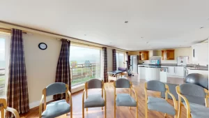 Group therapy room, with chairs and a large scale window, for residents to take part in group therapy sessions at rehabilitation residential treatment centre, Ocean Recovery