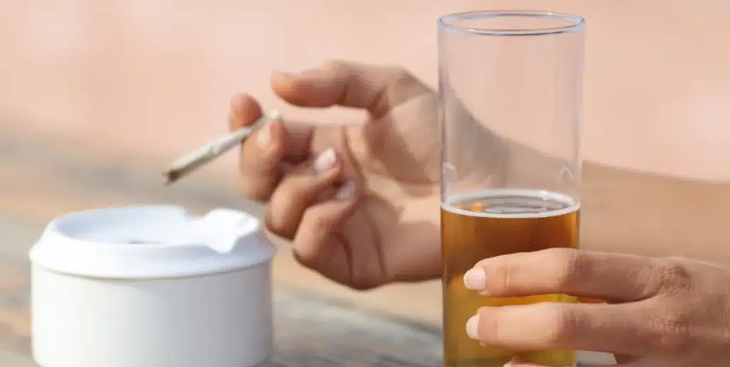 An image of someone Mixing Cannabis and Alcohol