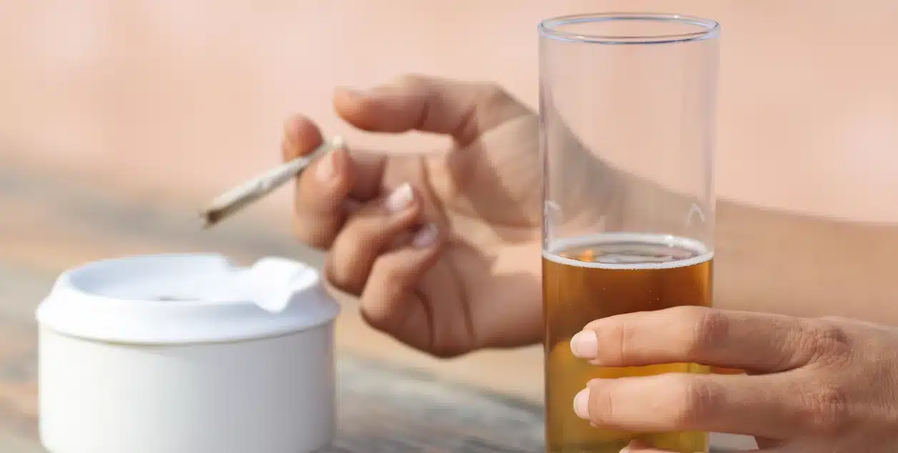 An image of someone Mixing Cannabis and Alcohol