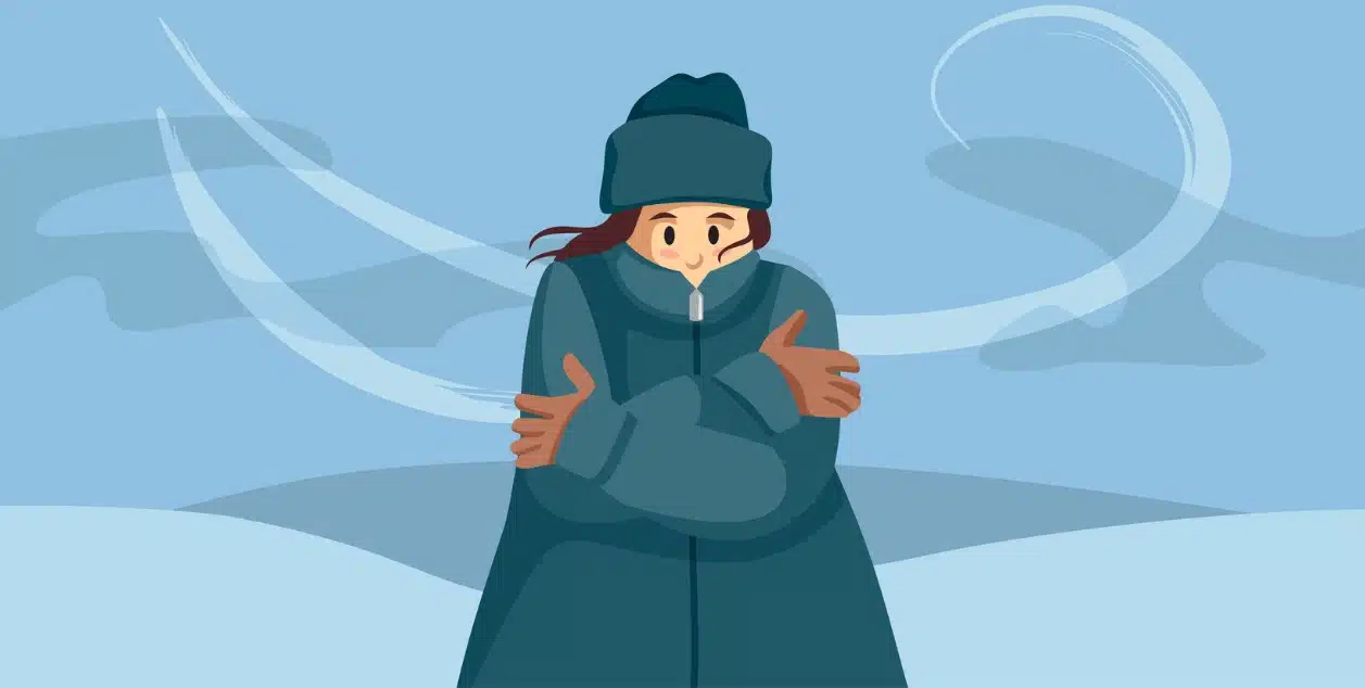 How the Winter Blues Can Impact Sobriety. An illustration of a girl in a winter coat with blue background