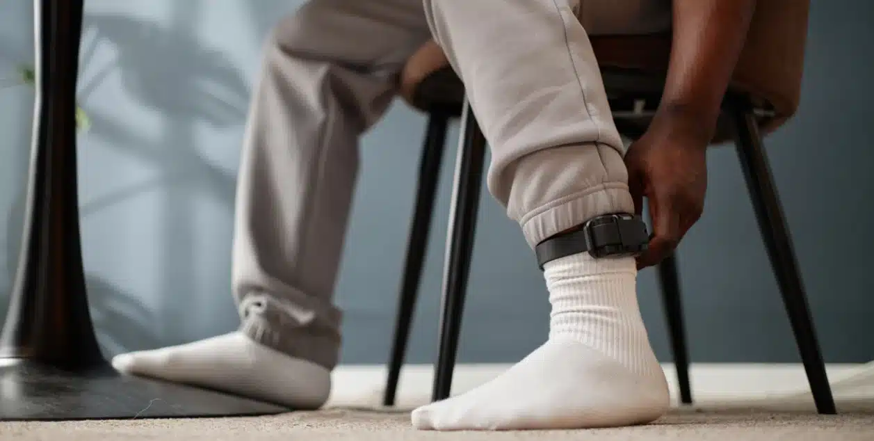 How Do Alcohol Tags Work? A man wearing a sobriety tag