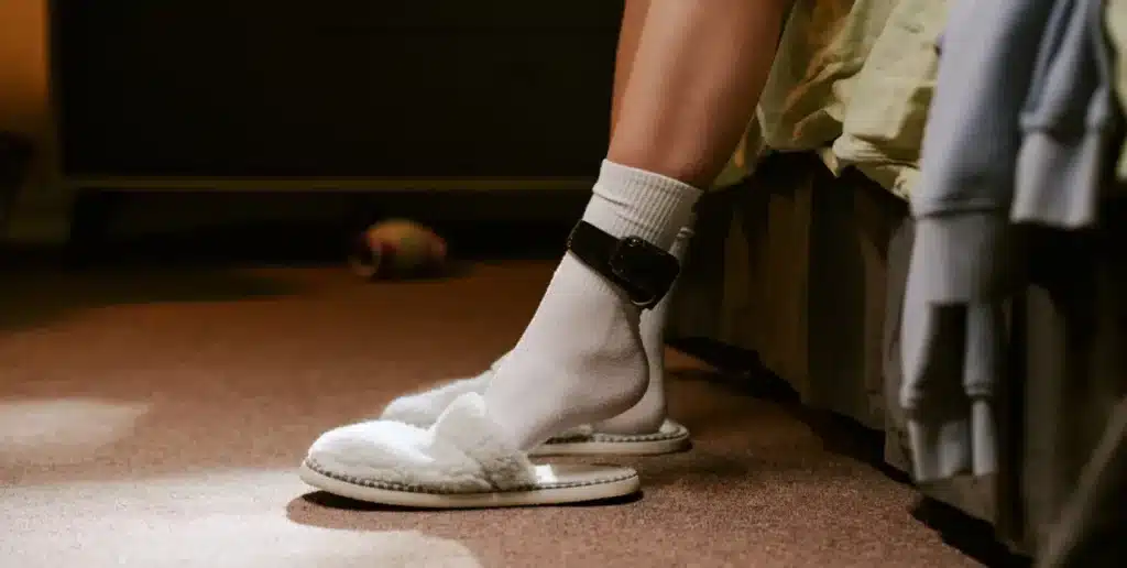 How Do Alcohol Tags Work? A womans leg with a sobriety tag