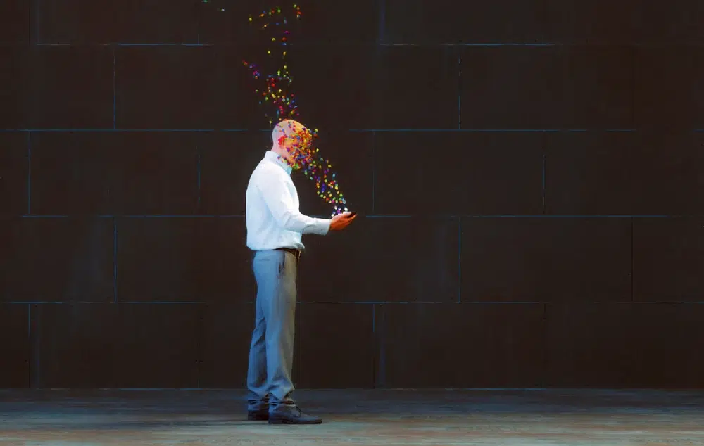 abstract business man using smartphone emitting multiple lights
