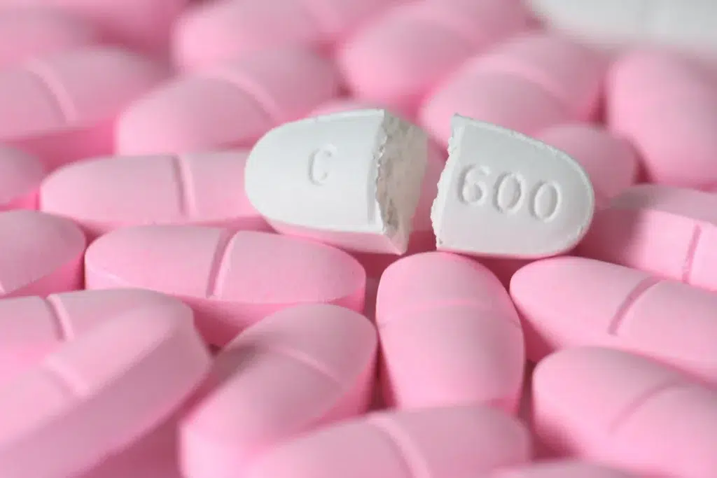 Image of pink and white co-codamol tablets.